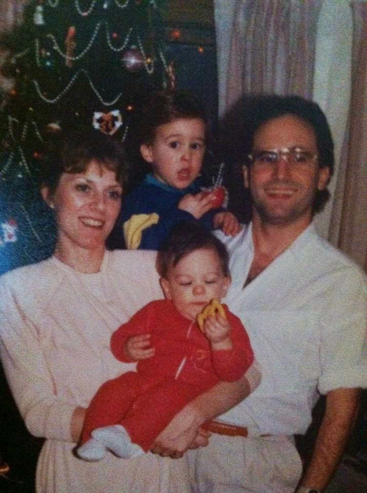 The author's immediate family in front of their Christmas tree.